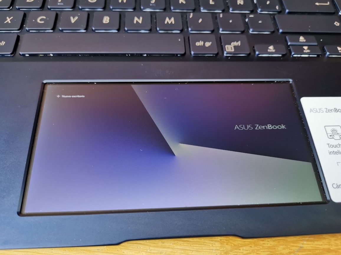 A MINI TABLET ON THE TRACKPAD OF YOUR LAPTOP